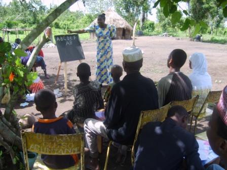 Moji giving literacy classes to herdsmen