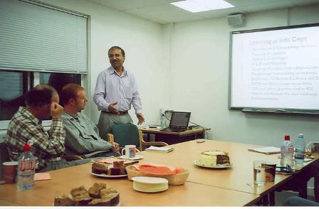 Shamprasad Pujar presents to colleagues at the Institute of Development Studies