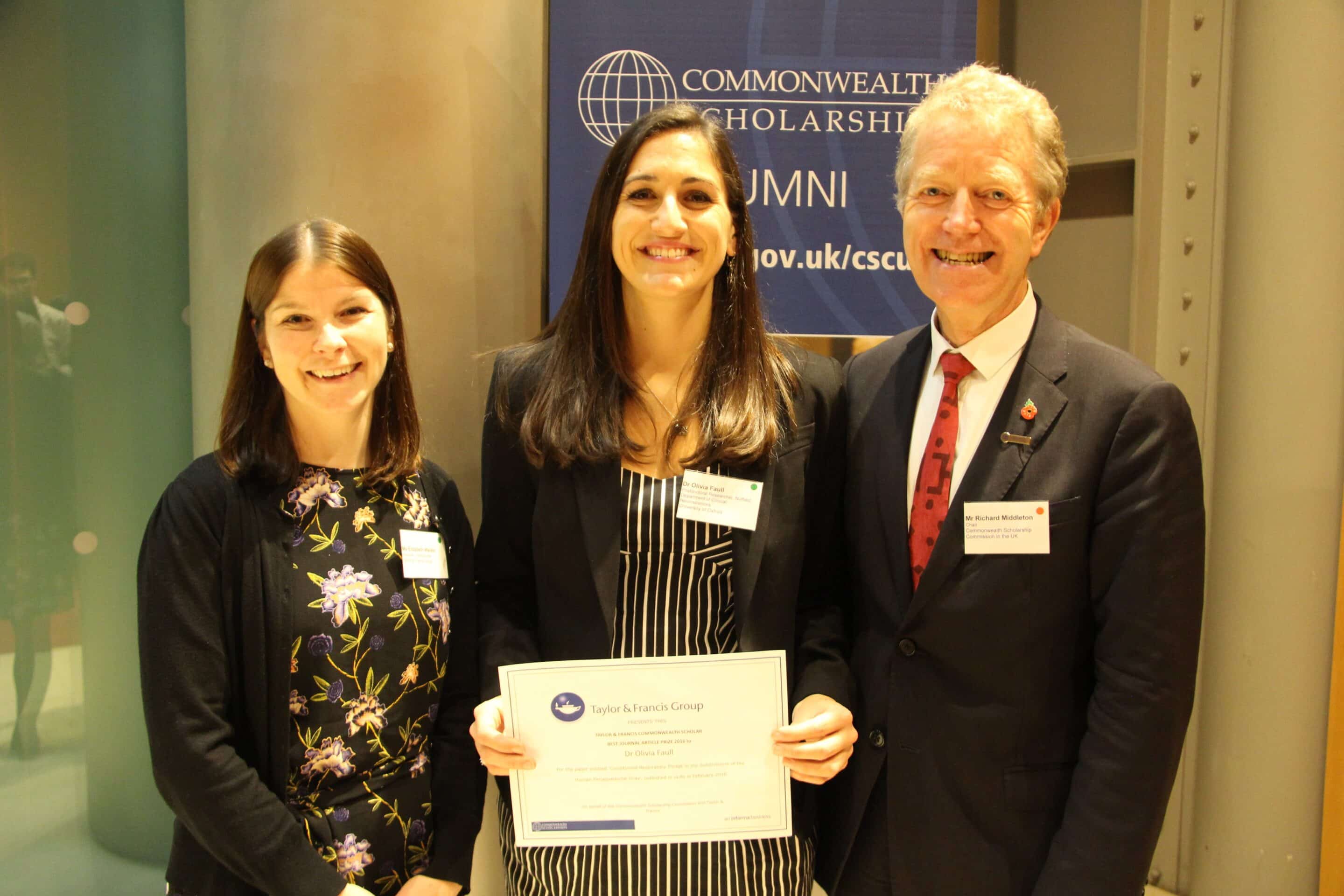 2016 Taylor and Francis Commonwealth Scholar Best Journal Article Winner Dr Olivia Faull with Mr Richard Middleton, Chair of the Commonwealth Scholarship Commission in the UK and Elizabeth Walker from Taylor and Francis Group.