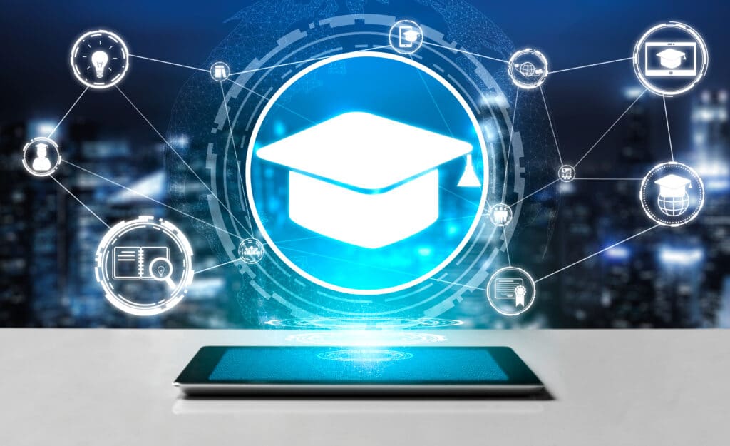 A scholar hat floating above a tablet