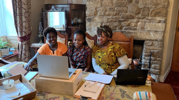 The Fellows at home in Salford attending an online lecture