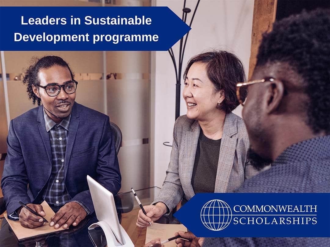 Leaders in Sustainable Development programme event page image Two men and a woman sitting making notes and talking.