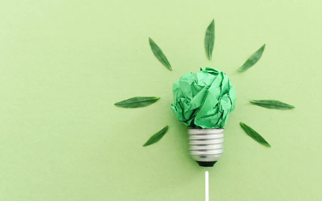 Concept of green crumpled paper lightbulb