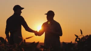 Image of farmers shaking hands