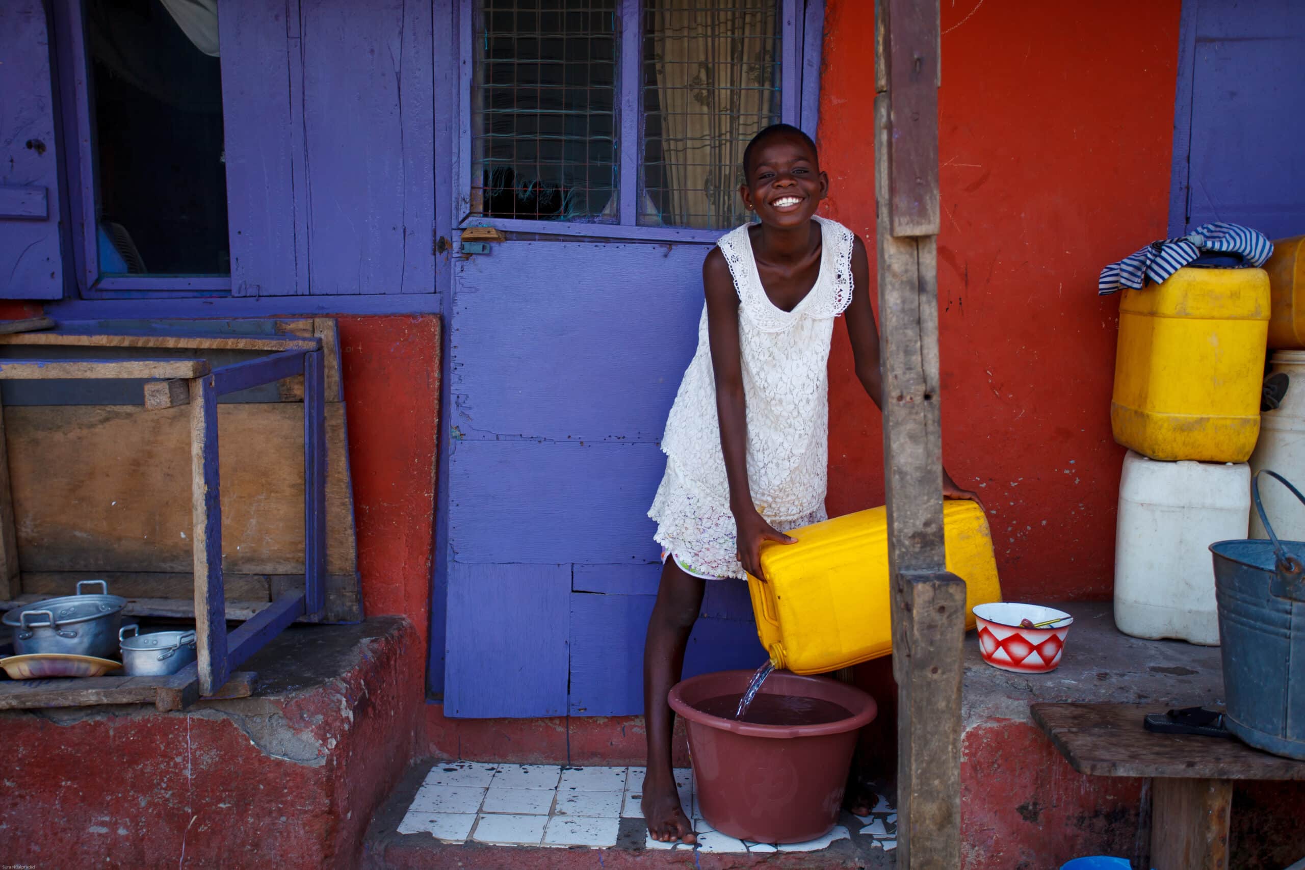 Girl pouring water