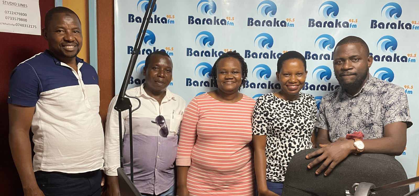 Dr Kiyuka and colleagues in the radio studio
