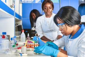  African medical students, scientists, young women working in research laboratory, medical test lab