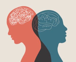Silhouette of two heads and outline of brain