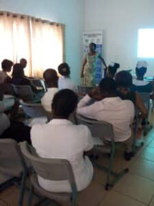 Dr Gloria Ansa presenting at a staff training session