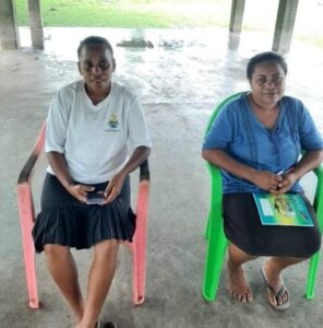 Deputy Principal Madam Doreen May and teacher Lovelyn Tione seated during the workshop