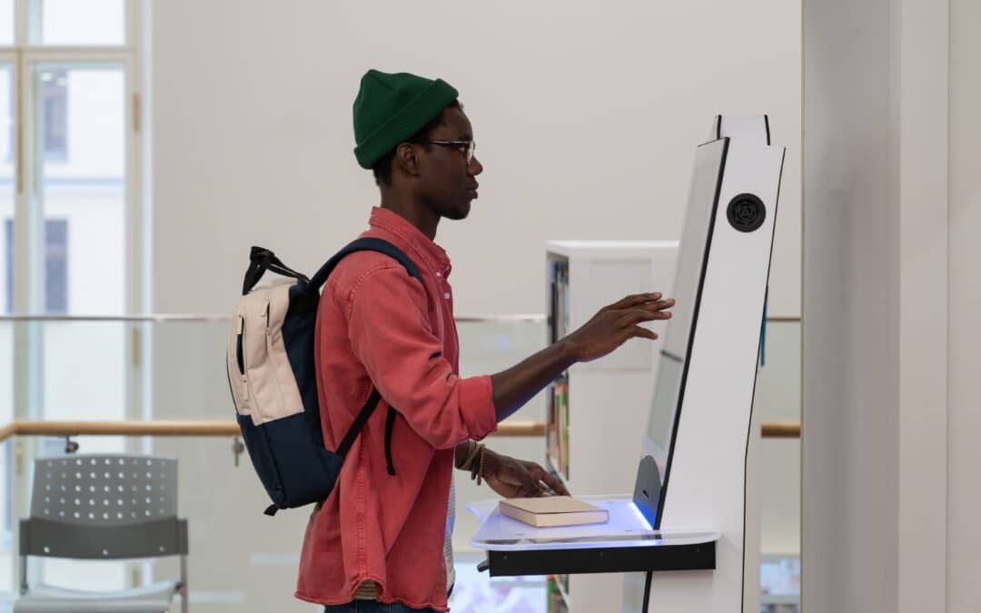 Young boy using library facilities