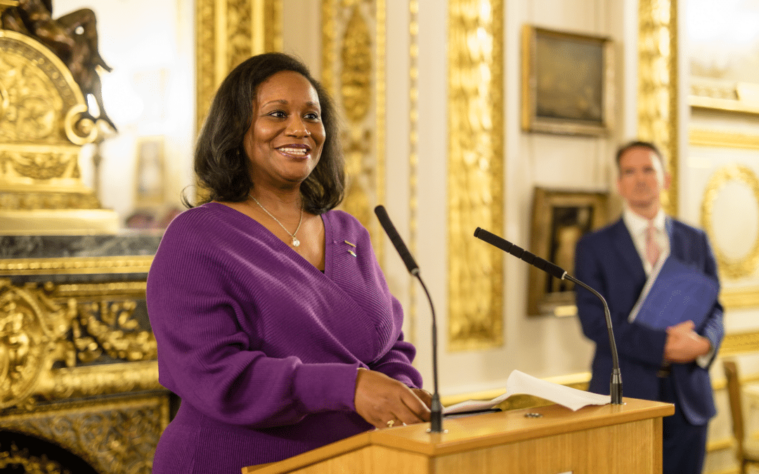 Dr Terri-Ann Gilbert-Roberts speaking at the 65th anniversary reception